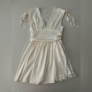 White silk mini dress. Brand unknown. Never worn